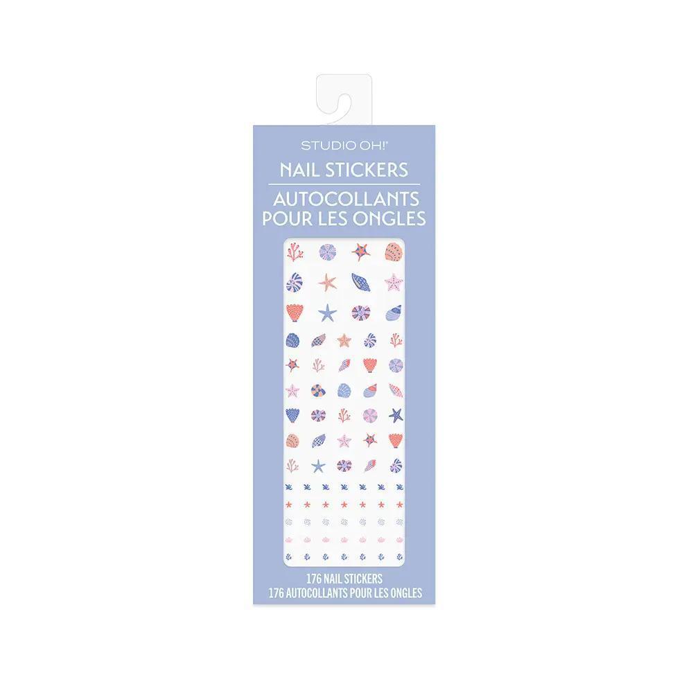 βCoastal Beach Nail Stickers by Studio Ohβ β Laid flat with seashells and a sunhat
βPeel & Stick Sea-Themed Nail Artβ β Close-up showing seashell and starfish designs