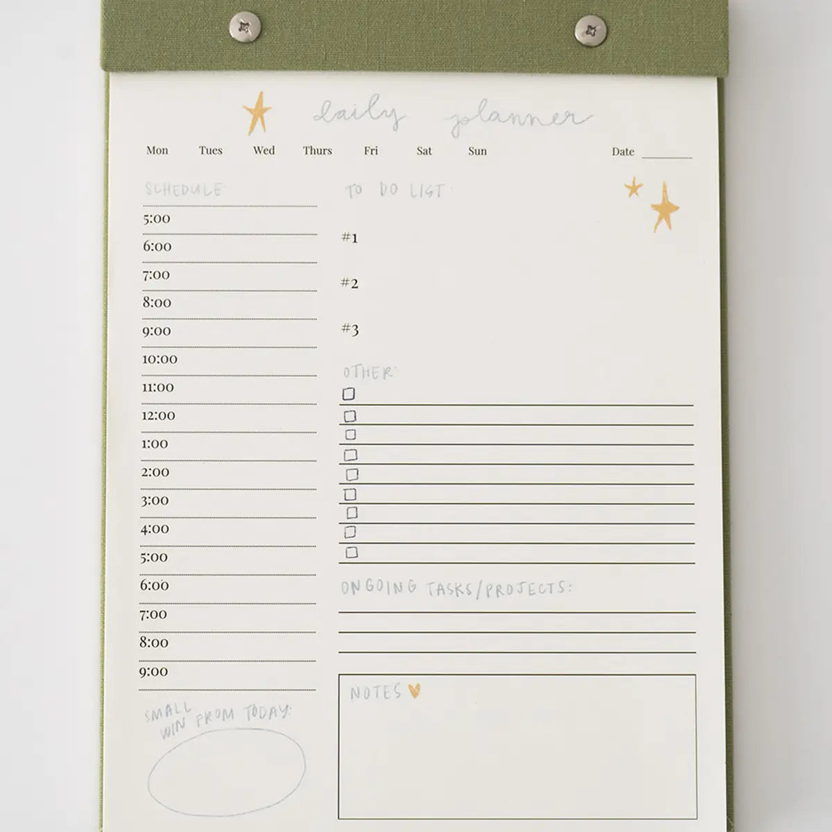 “Elegant Daily Planner Notepad” – Notepad with linen backing and silver hardware on a clean desk with pens
“Tear-Off Productivity Pad” – Page in use with to-do list filled in and planner accessories nearby