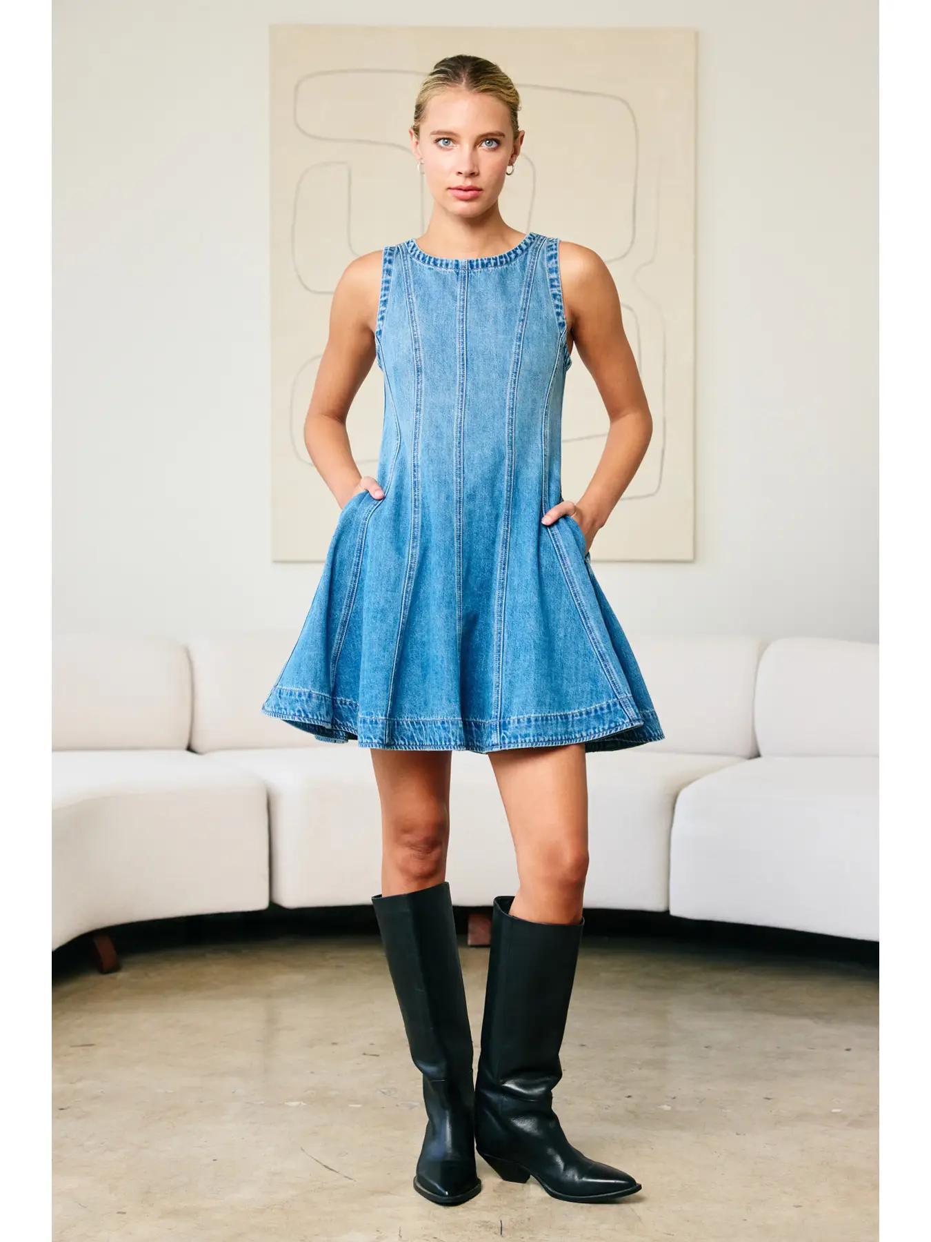 "Fall Layers Favorite" β Denim dress styled with a cream turtleneck and ankle boots
"Pocket Full of Pretty" β Close-up of side pocket detail on flared denim skirt
"Zip & Twirl" β Back view showcasing the zipper and flowy silhouette in motion