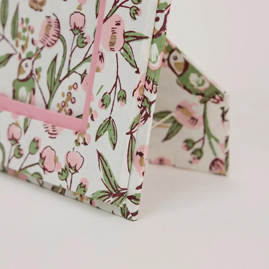 green and white paper mirchi frame