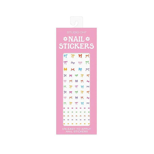 “Studio Oh Nail Sticker Sheet” – Flat lay of sticker pack with colorful nail polish bottles

“Peel and Stick Nail Art” – Close-up of vibrant stickers with bows
