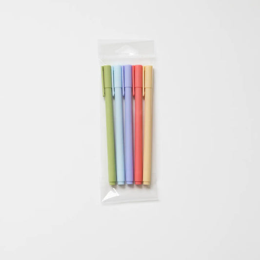 “Rainbow Gel Pen Set” – Set of 5 colored gel pens laid out on a pink journal

“Cute Desk Pen Flat Lay” – Gel pens styled with notepads, stickers, and stationery accessories