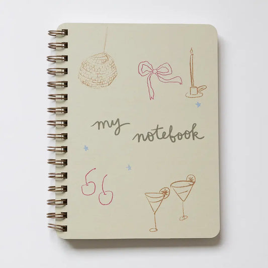 “Disco Bow Notebook Flat Lay” – Spiral notebook styled with glitter pens, lip gloss, and heart-shaped accessories

“Cool Girl Stationery” – Close-up of notebook cover with bold disco bow design and spiral detail