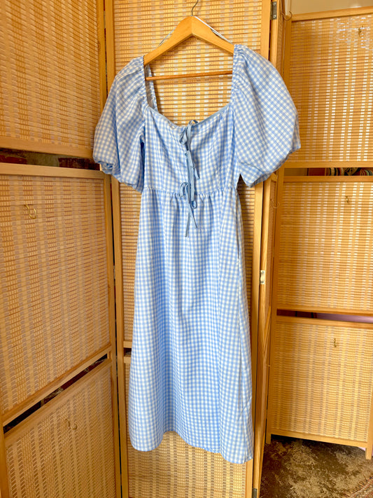 Black-and-white checkered midi dress with square neckline