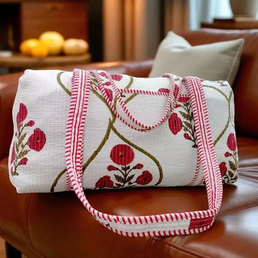 “Fall in Full Bloom” – Tote bag sitting on a bench surrounded by fall leaves

“Pumpkin Patch-Ready” – Model holding the tote while wearing a cozy fall outfit

“Floral & Functional” – Close-up of burgundy floral print and quilted texture