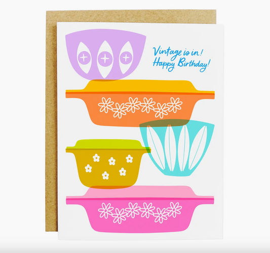 Vintage Is In Birthday Card featuring playful neon illustrations of retro Pyrex and cookware