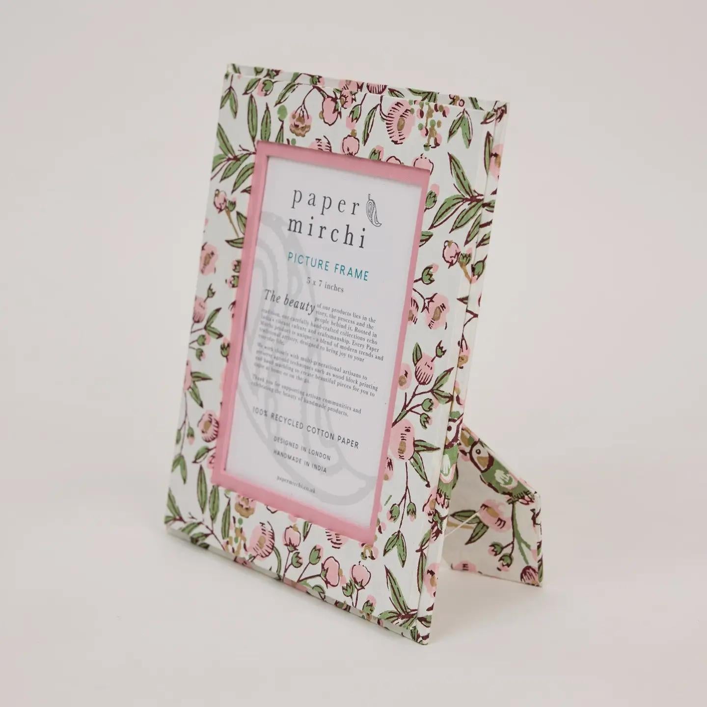 green and white paper mirchi frame